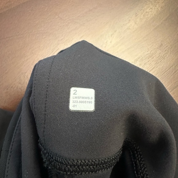 Lululemon Wunder Train Mesh Panel High-Rise Tight 25"
Black - Picture 10 of 11